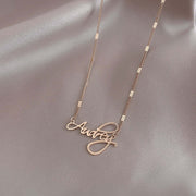 Personalized Name NecklaceB O X ∙ C H A I N ∙ N A M E ∙ N E C K L A C E• Material: High Quality Solid 925 Sterling Silver• Dimensions: Depending on your font choice, height sizes range from 3mm to 4mm lowercase.• Finish: Sterling Silver ∙ 18K Gold ∙ Rose