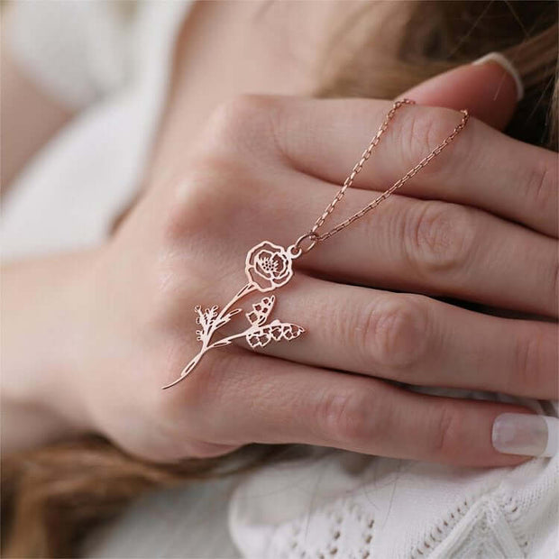 Multiple Birth Flower NecklaceEmbrace the beauty of family and nature with our exquisite Multiple Birth Flower Necklace. Each pendant is delicately crafted to represent the unique birth flowers of your loved ones, creating a personal bouquet that rests cl